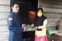 Penyemprotan cairan disinfektan sebagai antisipasi penyebaran virus Corona (Covid-19) di Kelurahan Tembilahan Hulu