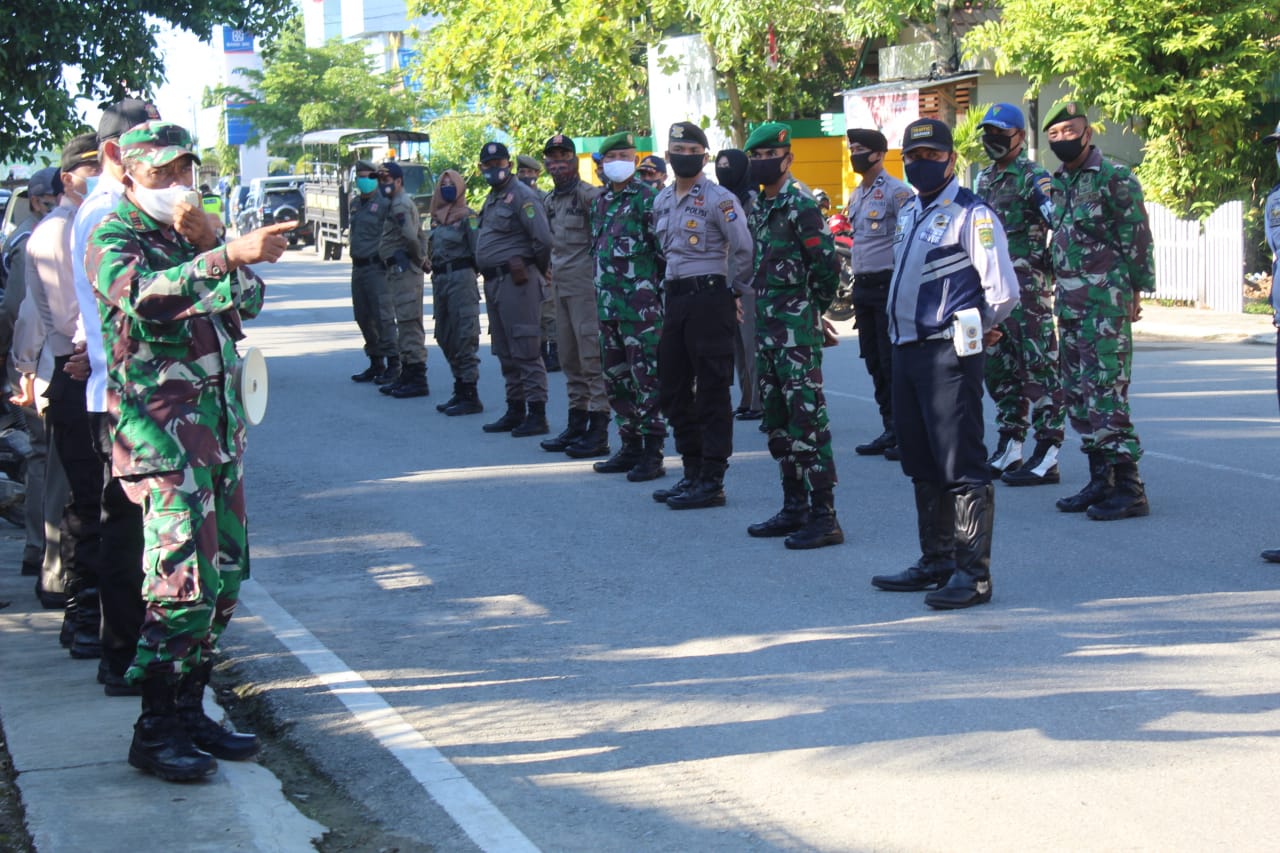 *Tim gabungan dari TNI, Polri, Satpol PP, BPBD dan Dishub Inhil yang tergabung dalam Tim Penegakkan disiplin kesehatan Covid 19,*