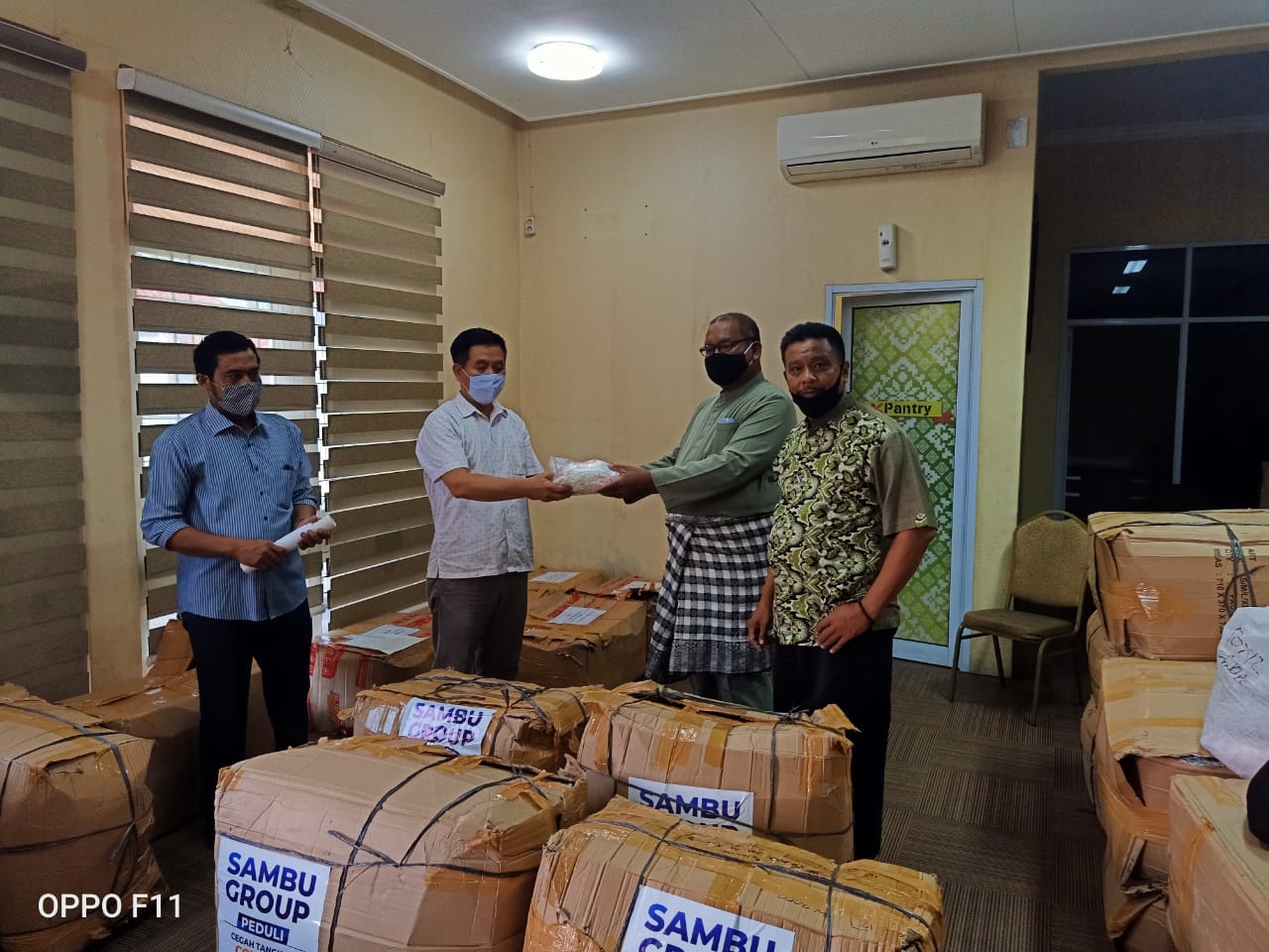 Sambu Group Serahkan Bantuan Masker untuk Riau