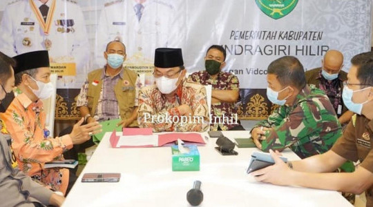 Bupati Inhil HM Wardan Ikuti Rakoor Penanganan Covid 19 Dan Mitigasi Bencana