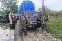 Babinsa Simpang Jaya Serda Siswanto Melaksanakan Pengamanan Logistik Pemilu Desa Gemilang Jaya